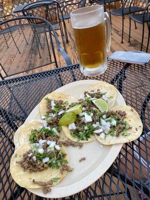 Two orders of tacos served on one plate. We had already taken two off the plate.