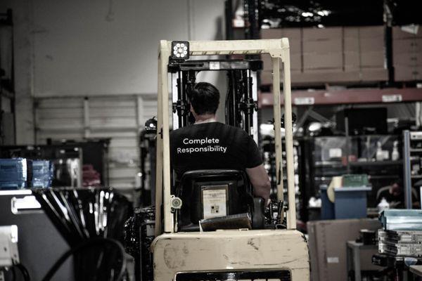 DMD Teammate preparing Tempe, Arizona warehouse for incoming shipments.