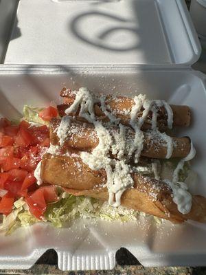 Shredded chicken stuffed crispy corn flautas.  A perfect light lunch.