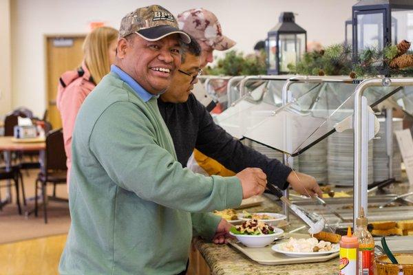 We offer buffet-style dining in Spruce Lodge; photo taken at Pastor & Spouse Retreat - Winter 2023.