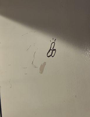 Resident/guest drew a p*** is PERMANENT marker on entry door. Maintenance has seen and not painted over