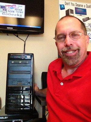 Stan Prager, president of GoGeeks, with one of the PCs we manufacture