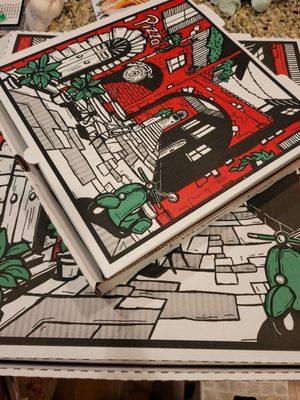 Classic pizza boxes. the small on top of the XLARGE.