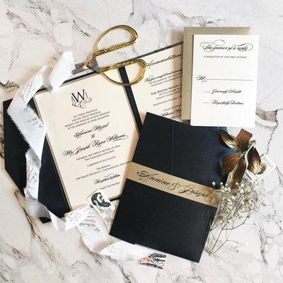 A gold, black and ivory wedding invitation suite designed for a wedding at the Merion in Cinnaminson, New Jersey.