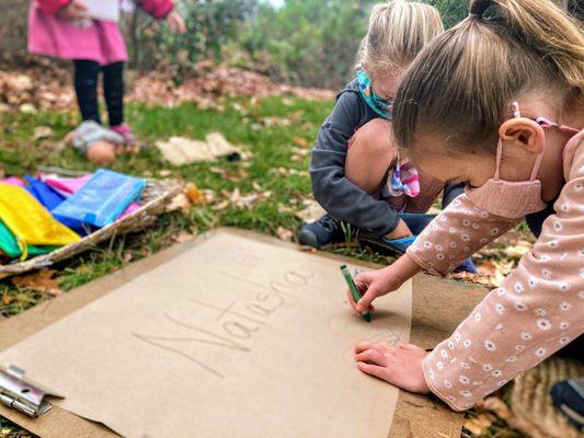 Practicing writing our name