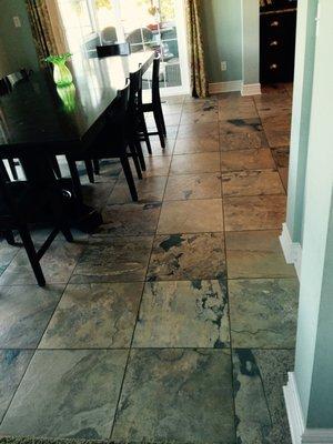 Natural slate---but in porcelain tile so you have the beauty but not the headaches of maintaining slate.