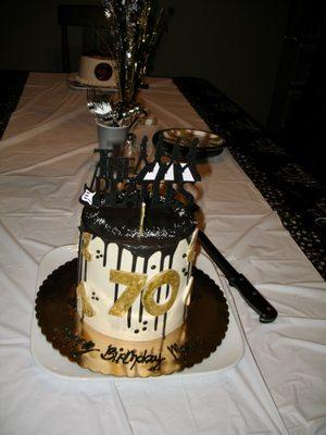 Cake design for The Beatles.  Outline of the band members reminiscent of Abbey Road.