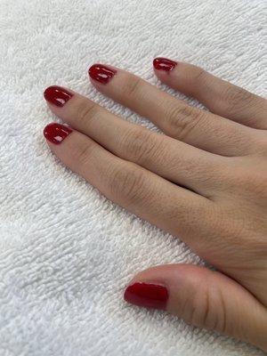 Red polish manicure