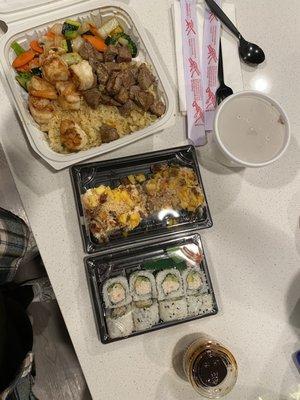 Ny strip and shrimp entree, tropical dream roll, California roll, side soup