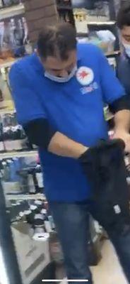 the other employee who grabbed and held my friend searching through his bag