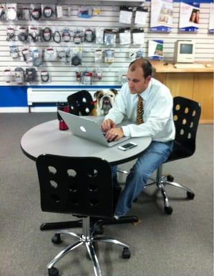 The owner Patrick working with his bulldog Bradshaw. I love seeing the dogs when I stop in.