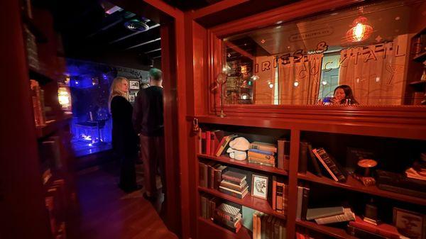 Secret book case opens up to the bar!