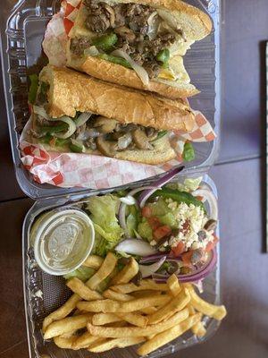 Cheesesteak sandwich + 1/2 fries 1/2 salad combo. So delicious and affordable!!!