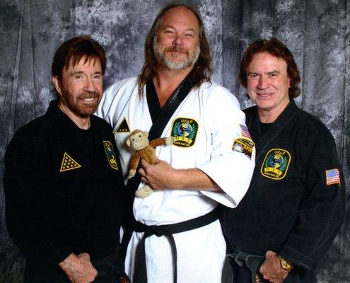 An old pic with Grandmaster Norris and his Brother Aaron. Now I am a master rank in his style  and wear the black jacket also!