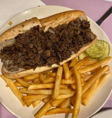 Philly Cheese Steak with fried onions, mushrooms, and Mayo with hot fries!