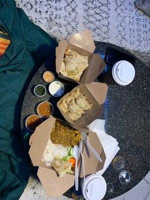 Paratha, pork momos, and chicken curry. All delicious!