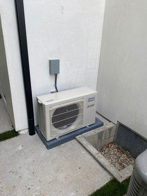 Mini Split Ductless 
 installed in Garage 
 12,000 BTU
 Heating & Cooling 
 Heat Pump