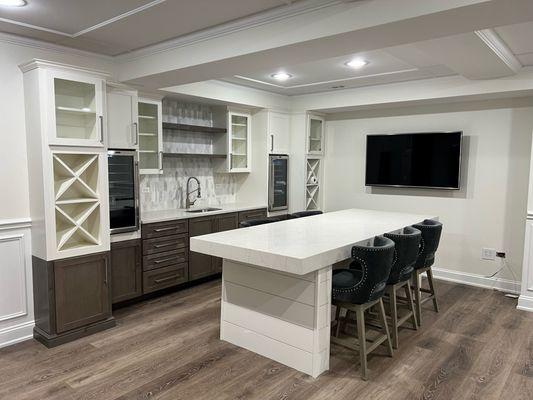 Quartz kitchen with mitered island.