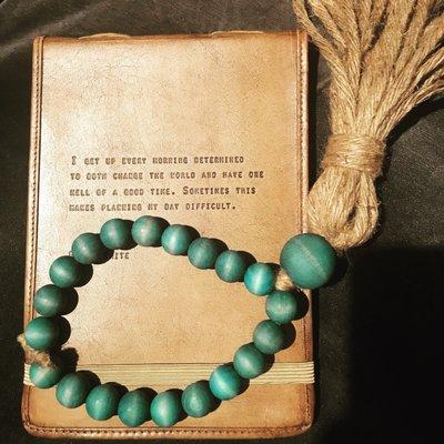 Our leather journals look great with hanging love beads