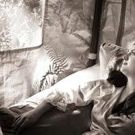 Relaxed bride receiving acupuncture before her wedding ceremony.