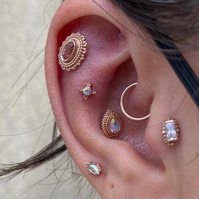 Helix, conch, outer conch, high earlobe all by Jade adorned with BVLA