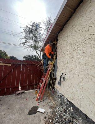 Brett working on the new electrical panel instal