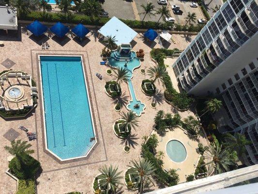 Partial view of the pool, kids pool, and waterfall  from my balcony