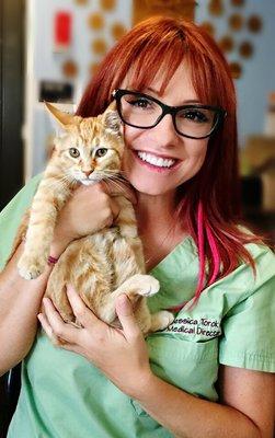 Dr Torok with our clinic kitty, Sunkist.