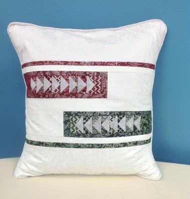 Christmas paper pieced pillow case with corded piping