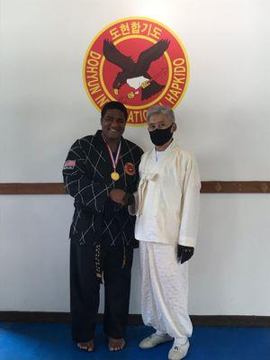 Myself and Grandmaster Song at my Second Dan black Belt Promotion