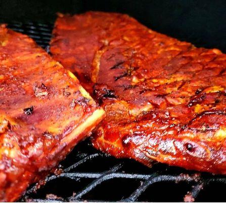 Slow smoked ribs with oak, hickory, cherry woods. NO PELLETS!