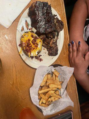 Ribeye* 12oz & Ribs  Baked Potato  Steak Fries