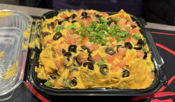 This was HALF (or small) of beef nachos, $8 tasty & impressive!