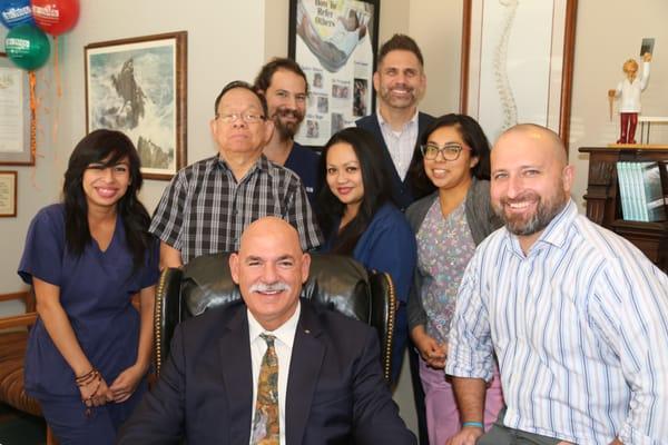 Dr. Bud with his associate doctors and staff.