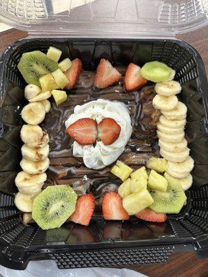 Nightmare crepe - Nutella, condensed milk, chocolate syrup with fresh fruits.