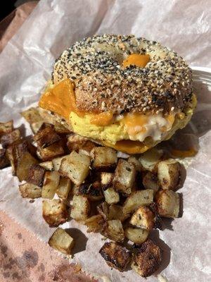 Your Call - Everything bagel + Vegan Cheddar + vegan sausage + vegan egg and Side Breakfast Potatoes