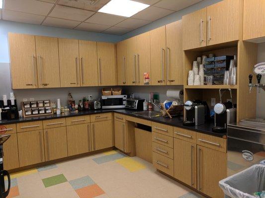 The 14th floor kitchen is cozy and has everything you need!