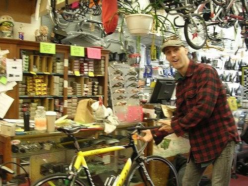 Mark poses with a bike, Fall 2009.