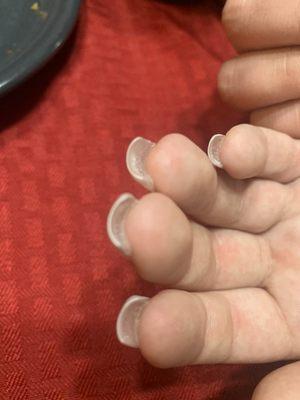 Glue in between my finger and my nail.