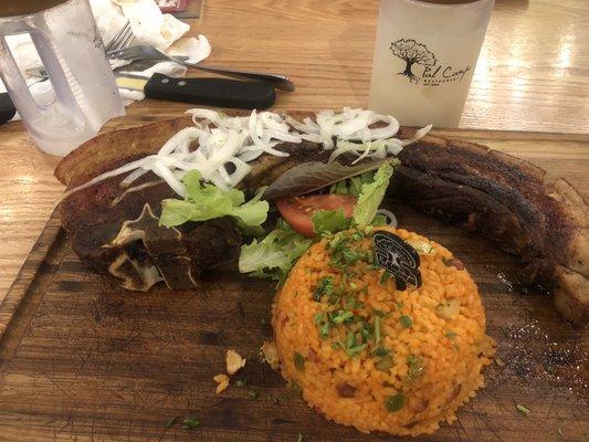 Rice with beans and chuletada pork chop.