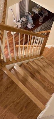 They did a great job of matching the hardwood stairs to the existing downstairs hardwoods and to the upstairs LVP