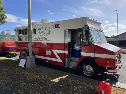 Nice and new looking red/white food truck.