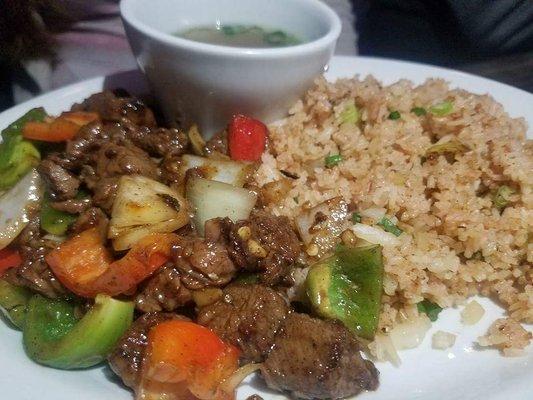 Shaken Beef... with a bed of tomato rice!! Amazing flavors, tender beef. Must order!!!