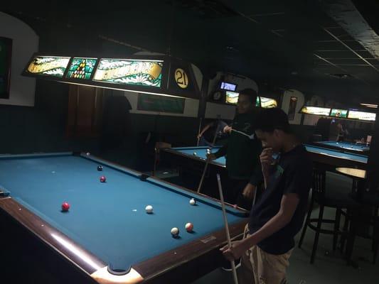 A couple pool tables