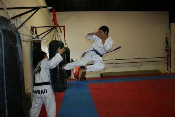 Our son Vince doing his flying side kick