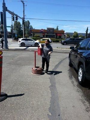 waiting for her to finish car to grab tip she&took it she's a regular cashier inside looks illegal