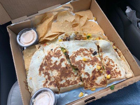 Chicken Quesadilla with extra El Queso sauce on the side