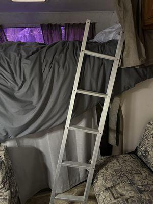 Broken ladder on the child's bunk.