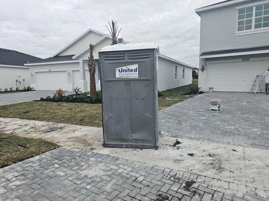 Toilet sitting in the middle of the walkways