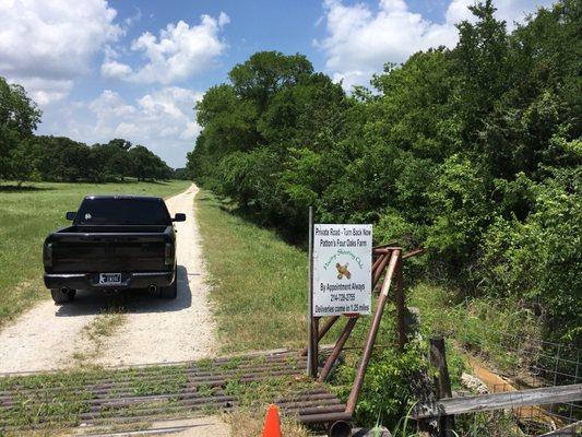 Look for this small sign (by the cattleguard) on the West side of Hwy 34.